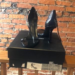 Yves Saint Laurent (runs small) fits like a 10